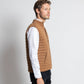 Gilet imbottito in lana merino con tasche color cammello