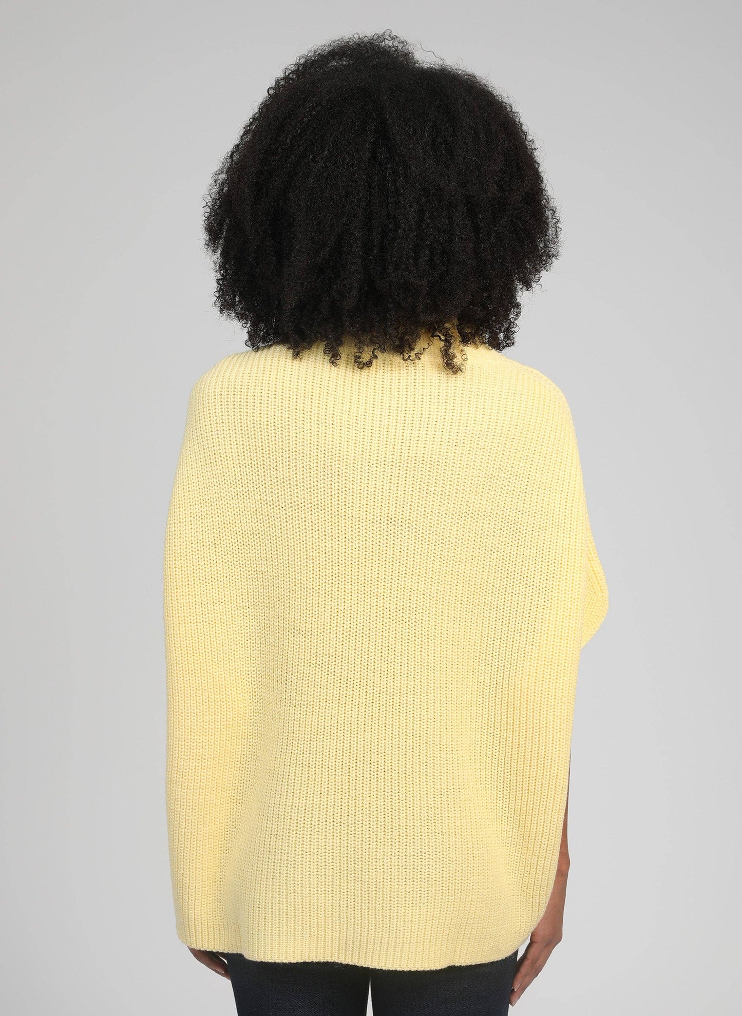Maglione dolcevita oversize senza maniche giallo pulcino