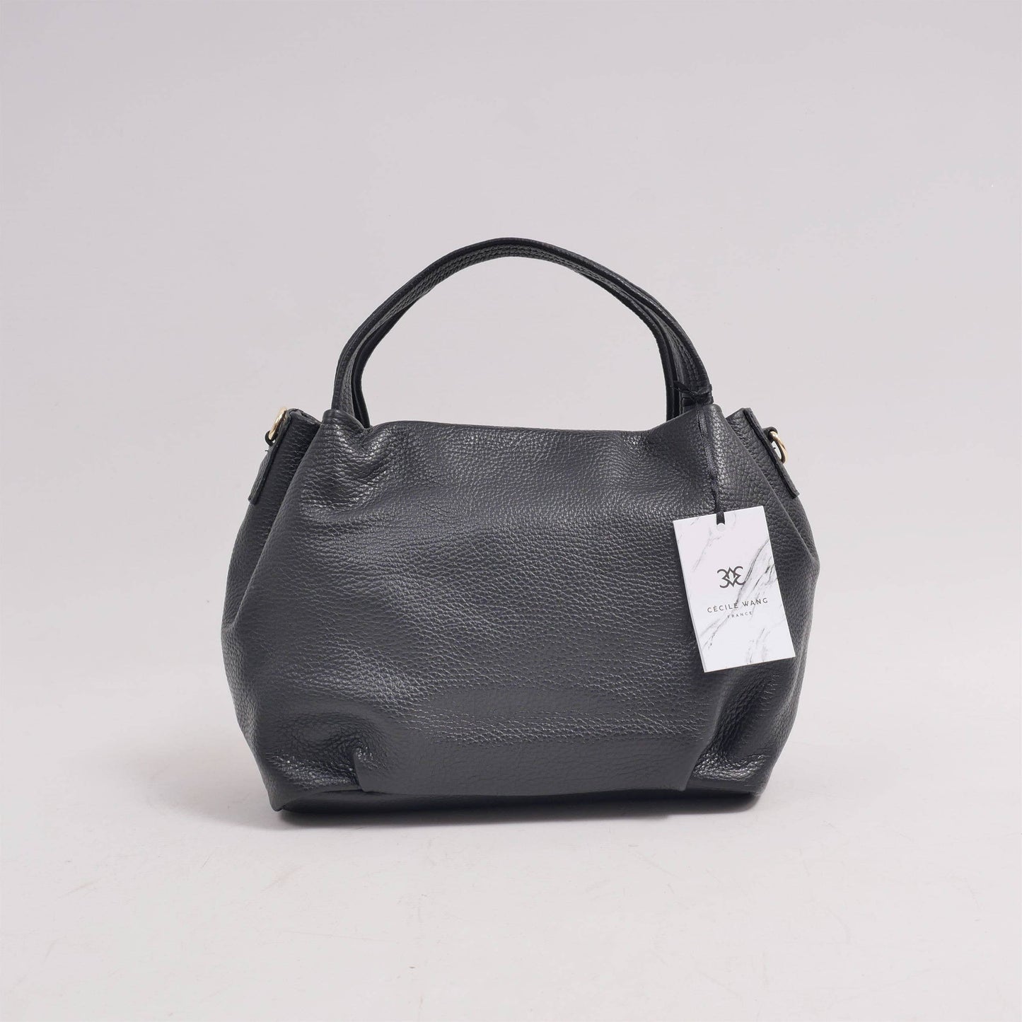 Borsa a mano e tracolla in pelle con finitura metallizzata