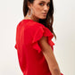 Top incrociato rosso con volant