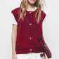 Gilet in maglia con bottoni a contrasto