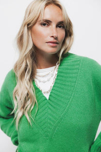 Maglione a maglia rasata con scollo a V