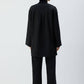 Giacca nera oversize con scollo a V e bottone