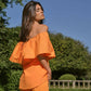 Top off-shoulder con volant in popeline