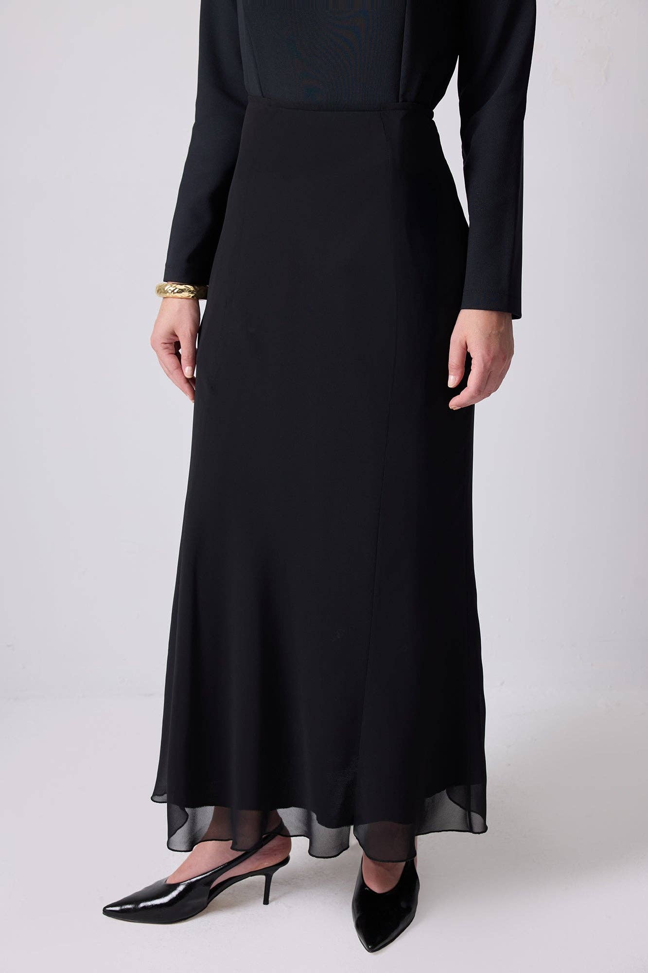 Gonna lunga in chiffon nero con orlo trasparente
