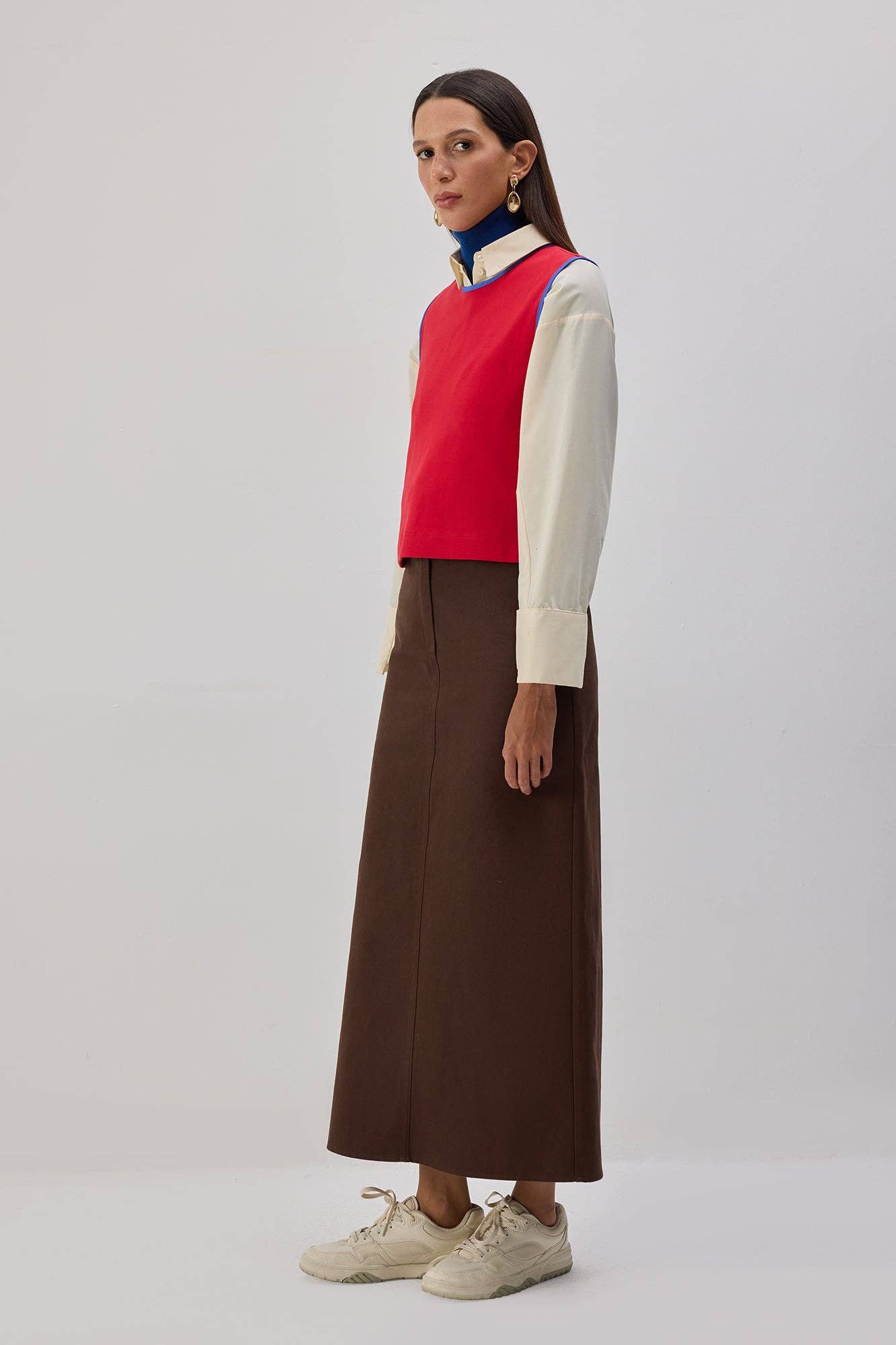 Maglione smanicato con profili a contrasto