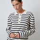 Maglione a righe con colletto polo