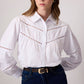 Camicia bianca con ricamo sangallo e maniche a sbuffo
