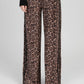 Pantaloni a zampa animalier vita alta