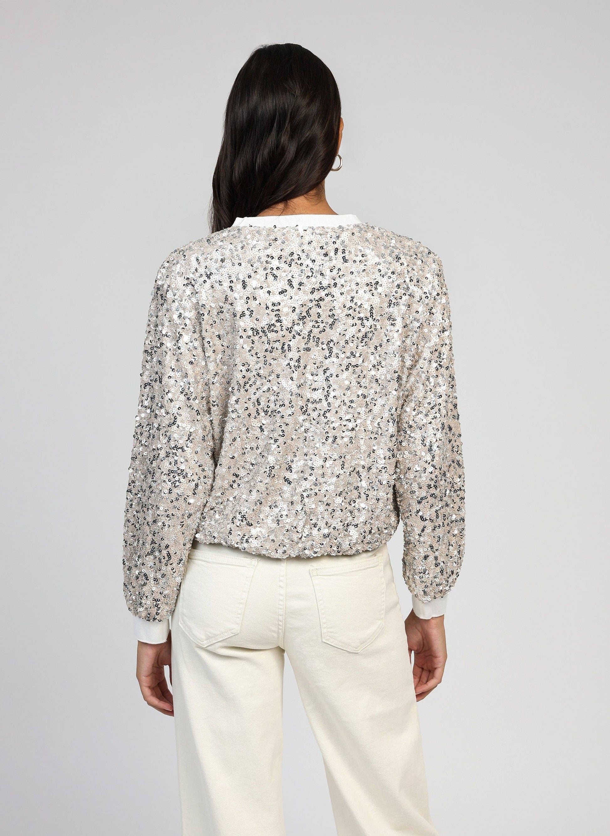Maglione tricot con paillettes effetto glow