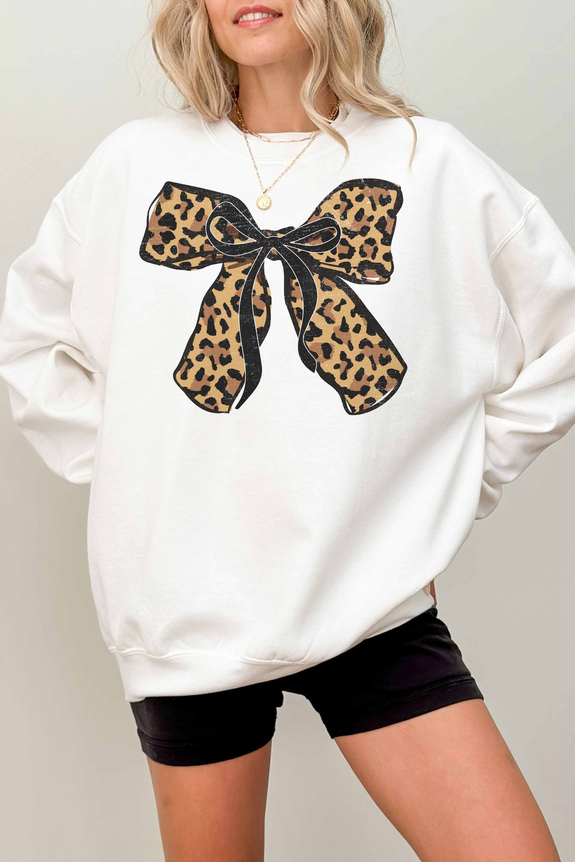 Felpa oversize con fiocco leopardato