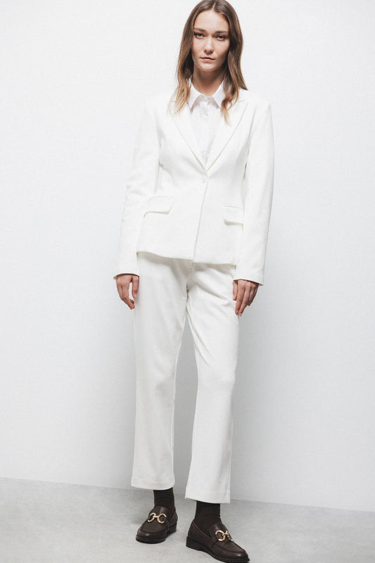 Pantaloni aderenti eleganti con tasche laterali