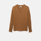 Maglione in lana a trecce con scollo a V
