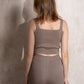 Top cropped in maglia con glitter
