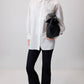 Camicia con spilla floreale in organza