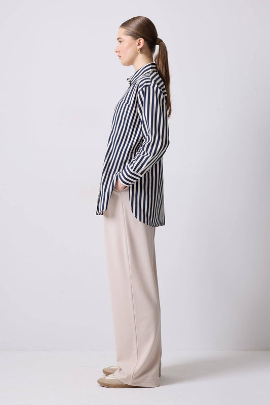 Camicia lunga a righe verticali con taschino