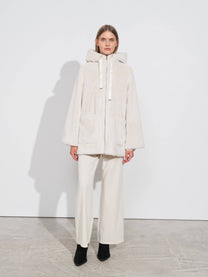 Cappotto in pile con cappuccio e zip