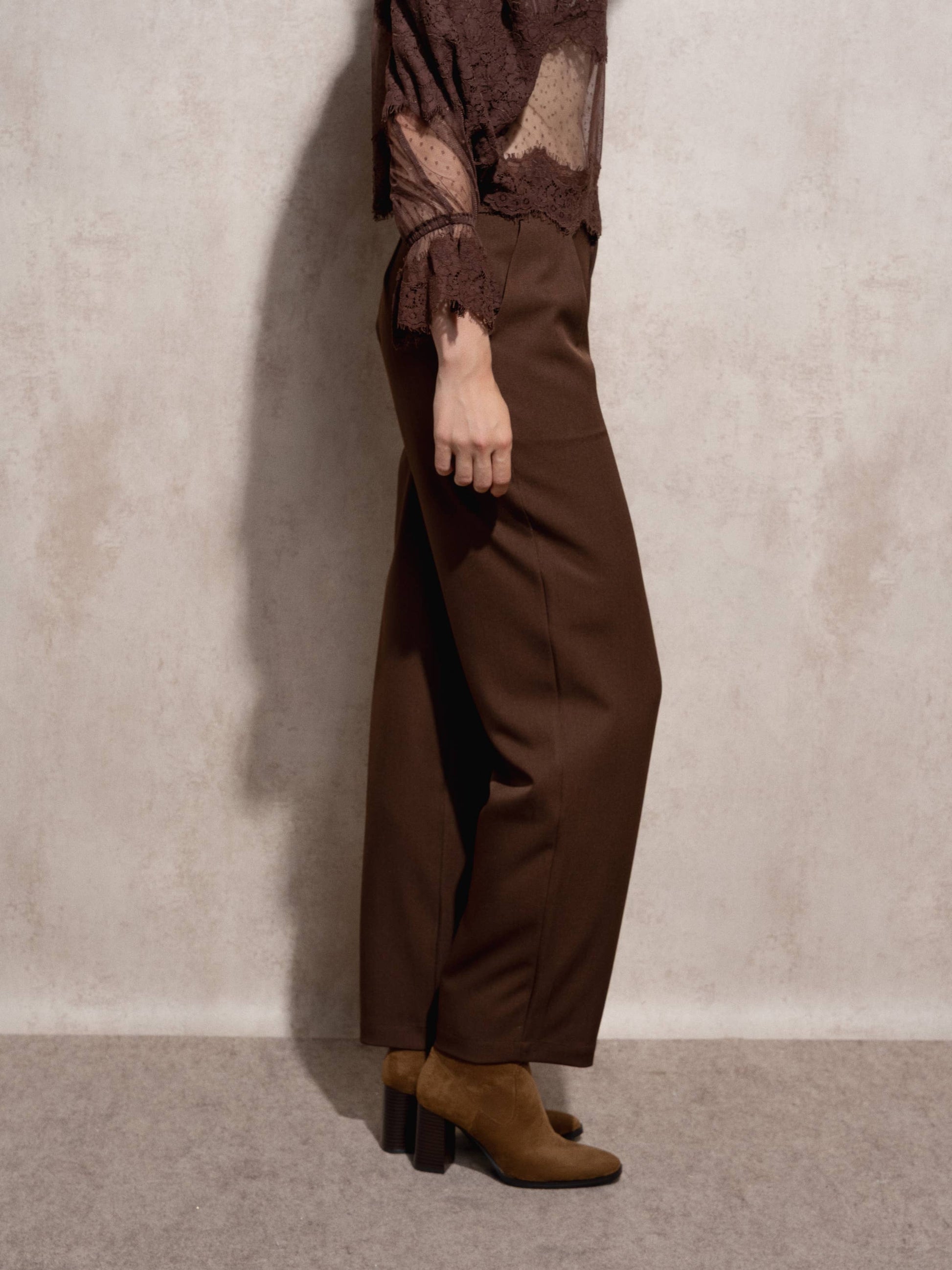 Pantaloni a pieghe a vita alta da donna