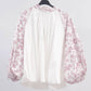 Blusa floreale con maniche a sbuffo