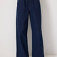 Pantaloni denim wide leg con vita elasticizzata