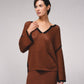 Maglione in maglia traforata con dettagli a contrasto e scollo a V