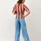 Blusa incrociata a righe multicolor