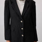 Blazer gessato nero con bottoni metallici