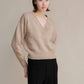 Maglione corto tweed con doppio scollo a V
