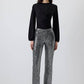 Pantaloni a zampa con paillettes