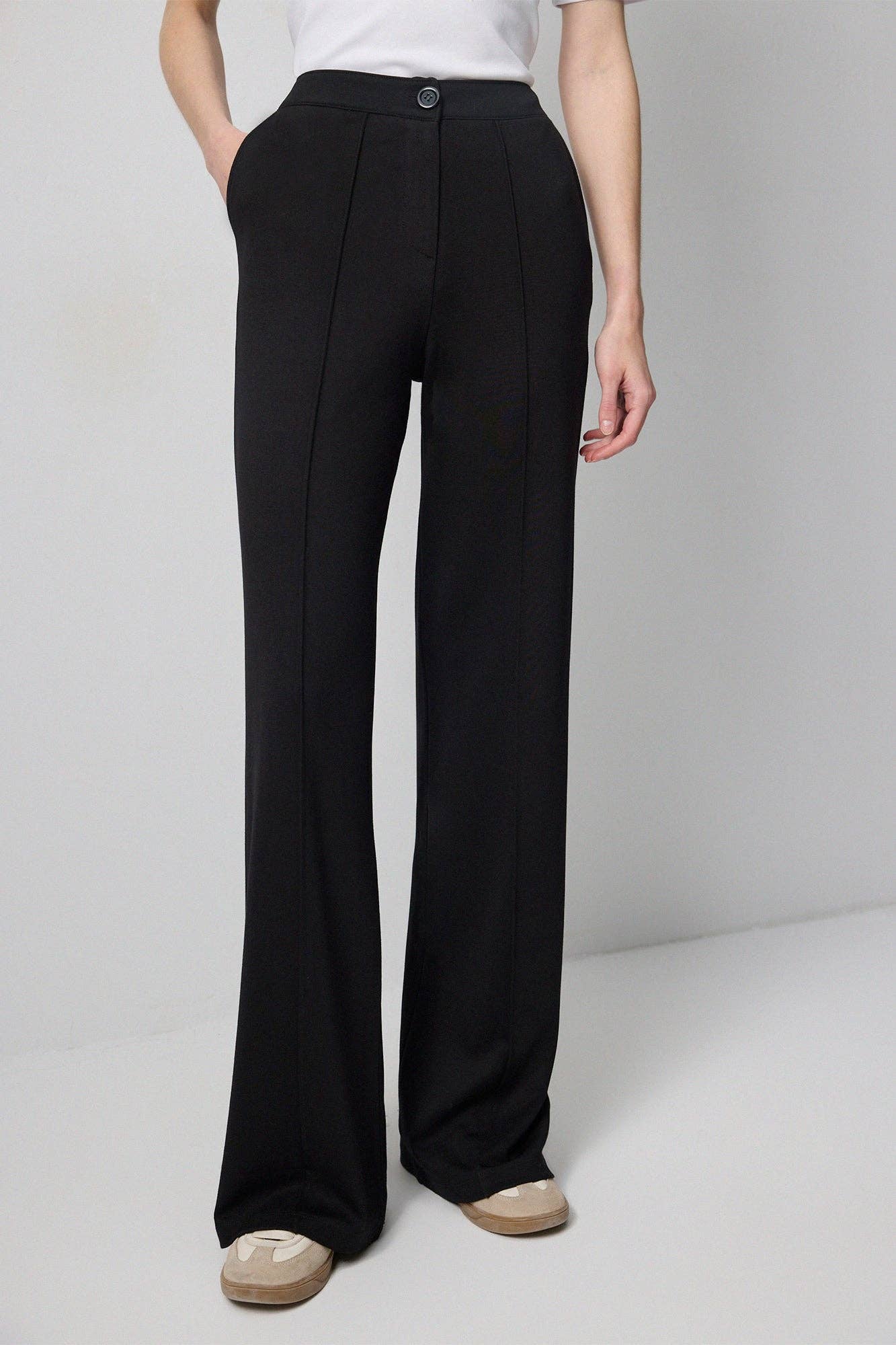 Pantaloni a maglia a coste neri a vita alta