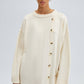 Maglione in maglia con bottoni asimmetrici ecru