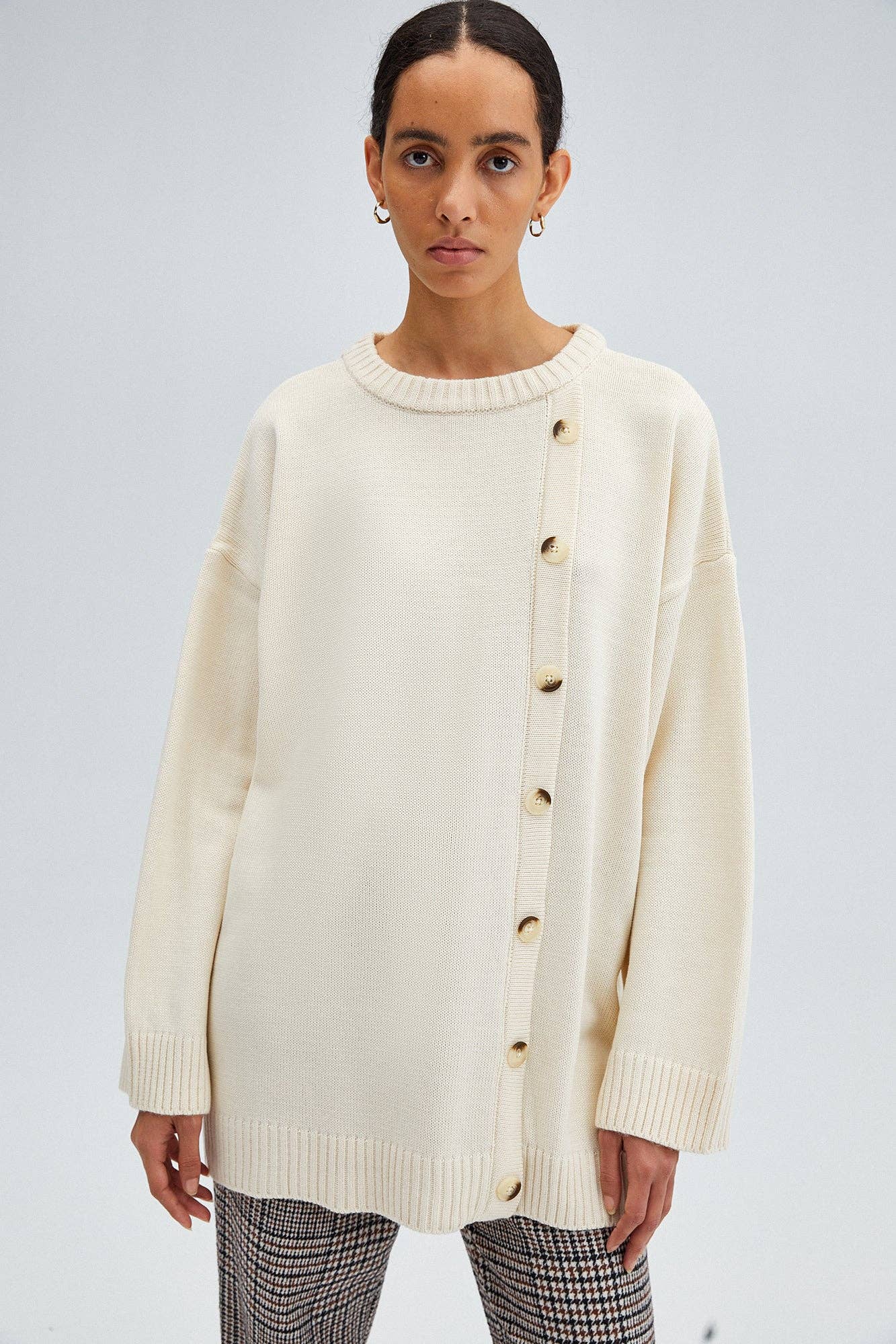 Maglione oversize con bottoni laterali