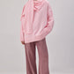 Maglione in maglia rosa con sciarpa integrata