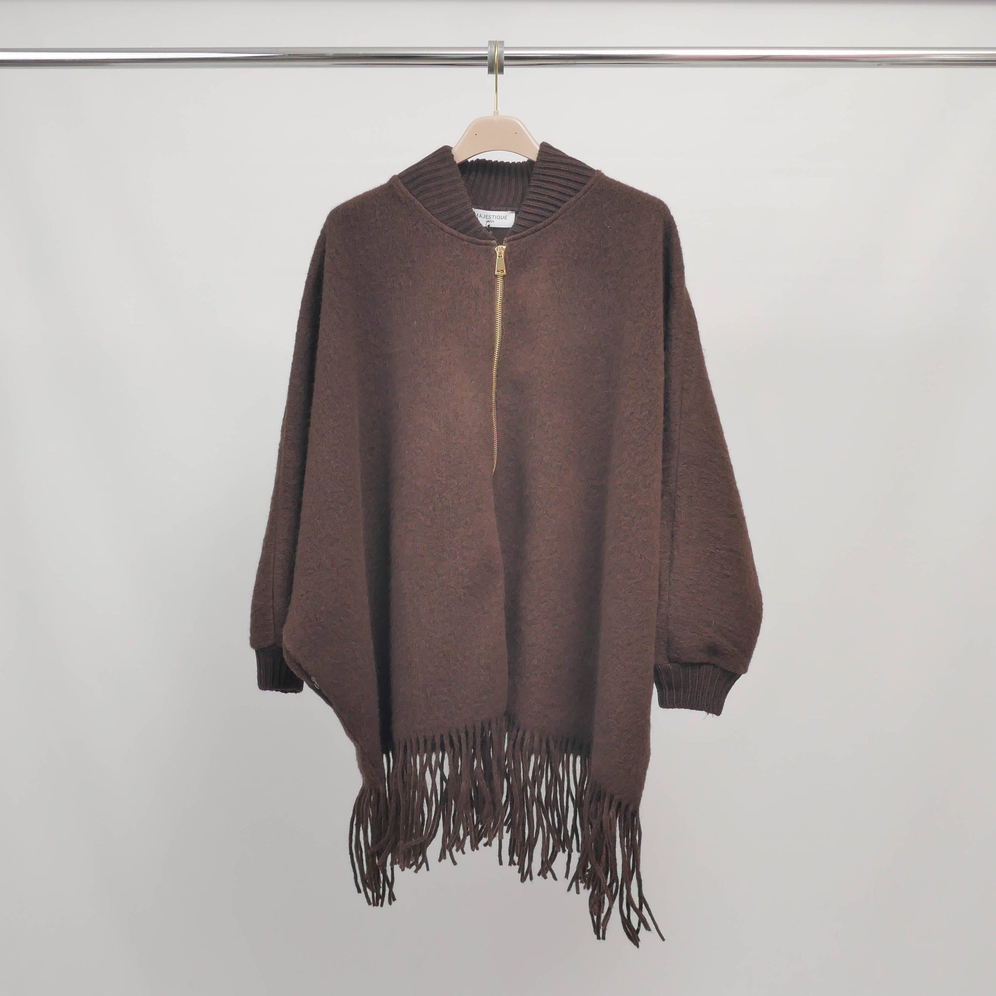 Poncho in maglia con frange e zip, maniche a pipistrello