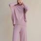 Maglione lungo dolcevita in misto cashmere con lavorazione 3D