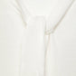 Maglione in maglia rasata con scollo a V e fiocco