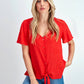 Blusa in viscosa lurex con nodo e scollo a V