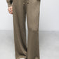Pantaloni ampi in tessuto testurizzato con coulisse