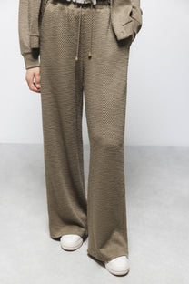 Pantaloni ampi in tessuto testurizzato con coulisse