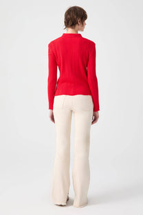Top in maglia a coste con colletto polo e bottoni