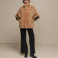 Cappotto teddy corto con collo alto e fibbie