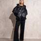 Cappa imbottita oversize con cappuccio e zip