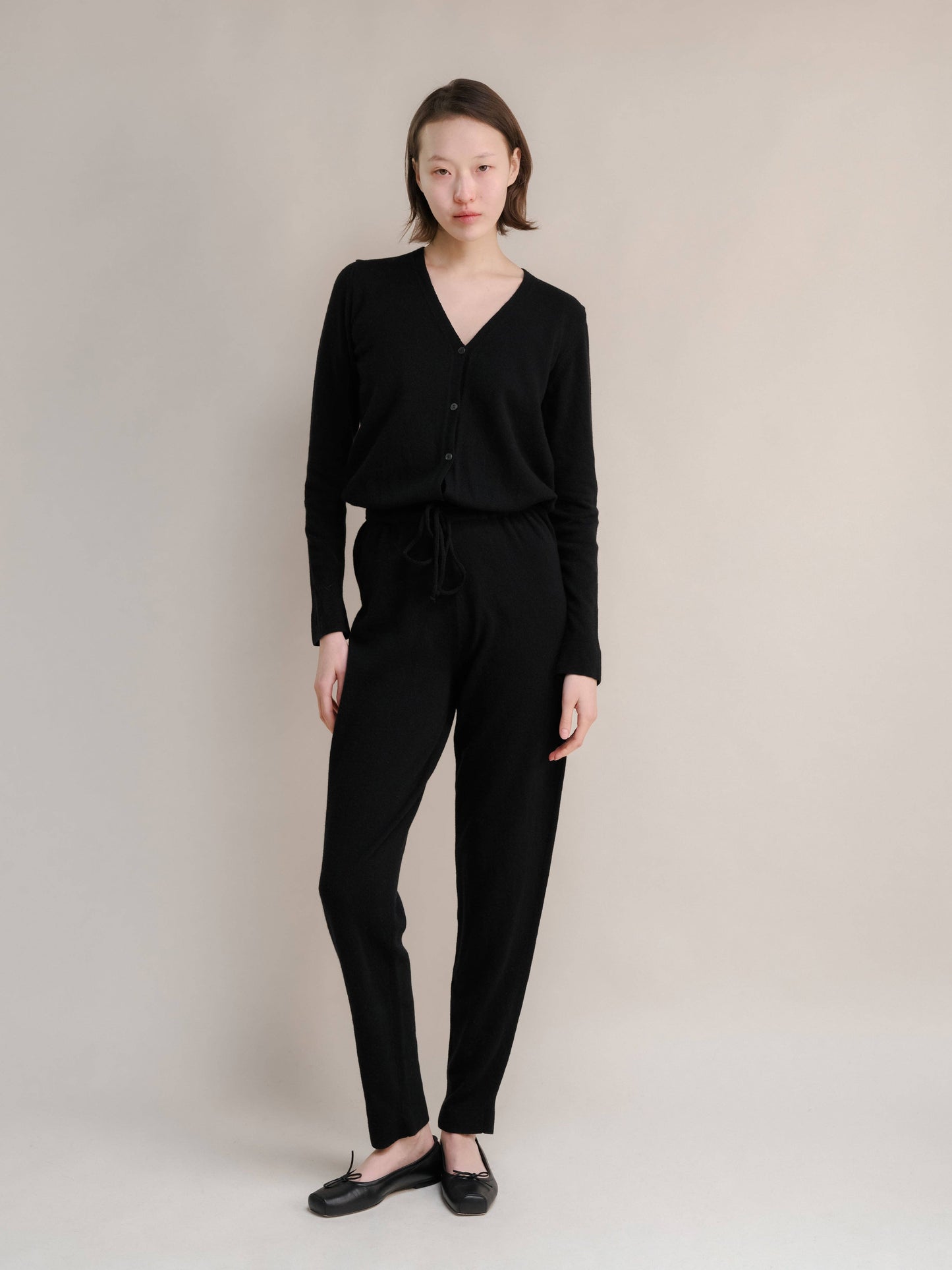 Tuta in misto cashmere con scollo a V