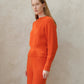 Maglione corto girocollo in misto cashmere con maniche raglan