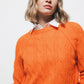 Maglione in maglia strutturata arancione con maniche raglan