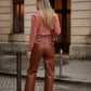 Pantaloni a zampa effetto pelle