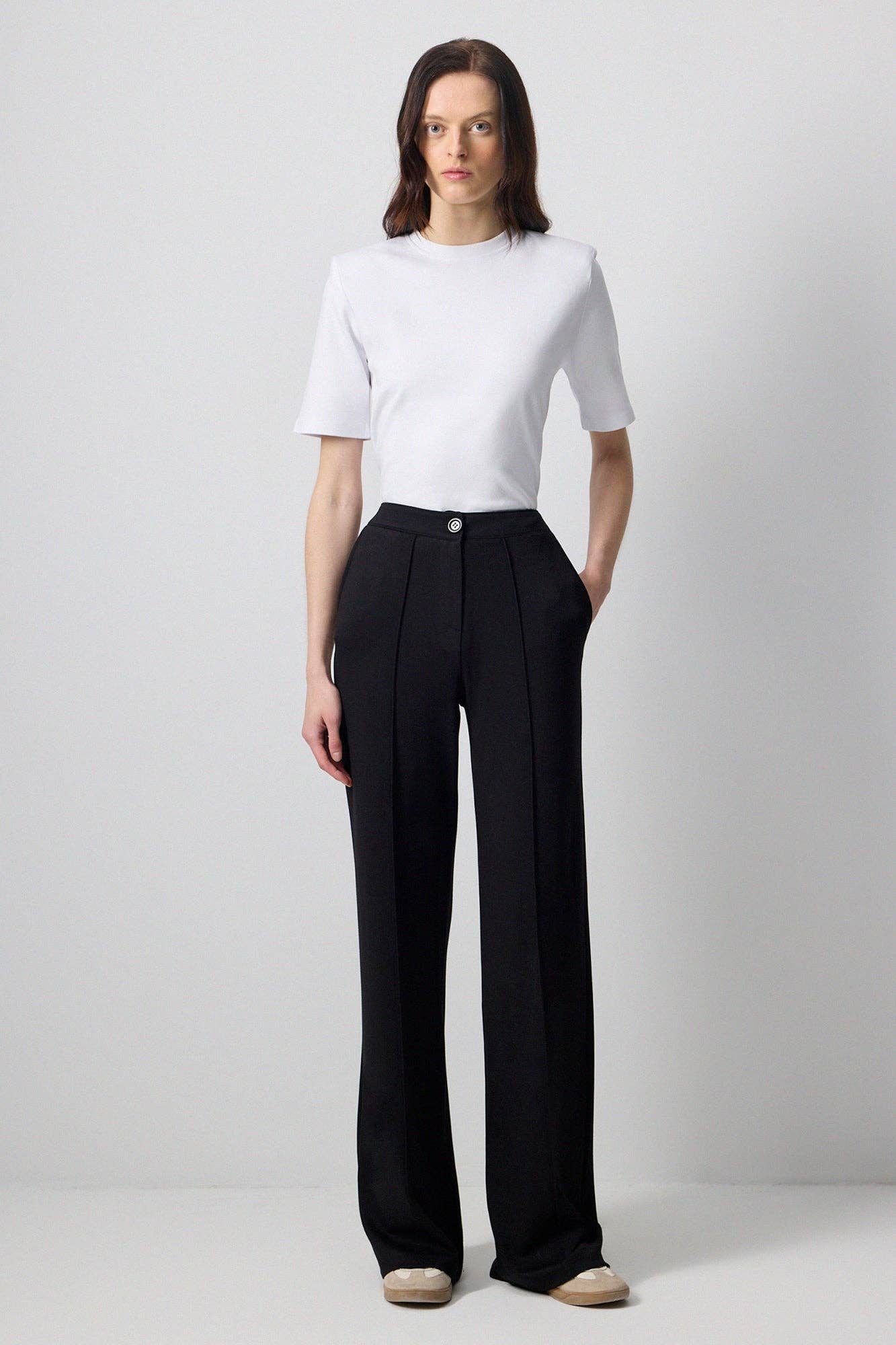 Pantaloni a maglia a coste neri a vita alta