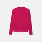 Maglione in maglia rasata con fiocco e scollo a V