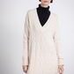 Abito in maglia intrecciata con scollo a V