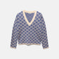 Maglione jacquard con motivo geometrico e scollo a V
